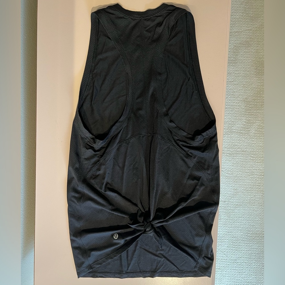 Black lululemon workout tank top with white stripes